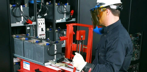 man performing ups battery installation